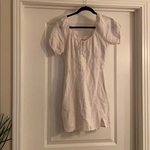 white dress with side pockets